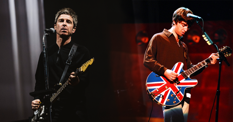 Noel Gallagher performing with his iconic Union Jack guitar