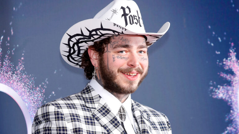 singer post malone wearing a hat