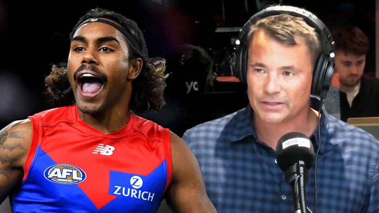 Triple M Footy journalist Jay Clark and Melbourne forward Kysaiah Pickett. This image has been digitally altered