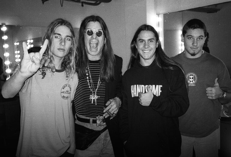 Rock band Silverchair pose for a portrait with Ozzy Osbourne at the Palace in Los Angeles, California on February 24, 1997. (Photo by Jim Steinfeldt/Michael Ochs Archives/Getty Images)