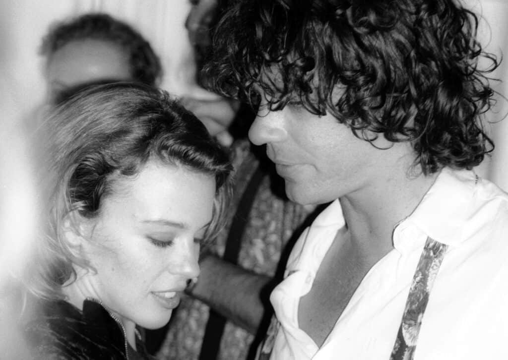 Michael Hutchence of INXS with Kylie Minogue at a party to celebrate Michael's 30th birthday on January 22, 1990 in Sydney, Australia. (Photo by Peter Carrette Archive/Getty Images)