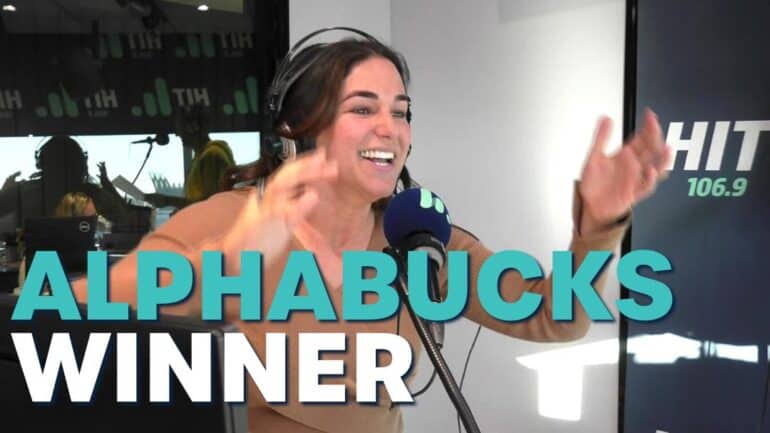 Jess celebrating and text saying 'Alphabucks winner'.