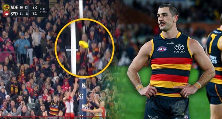 Taylor Walker in crows guernsey disappointed. Football pictured near goals