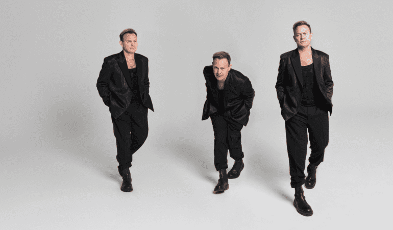 Three images of Jason Donovan in black suit.