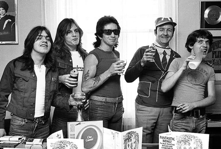 AC/DC, with manager Michael Browning at the WEA offices, 1976.