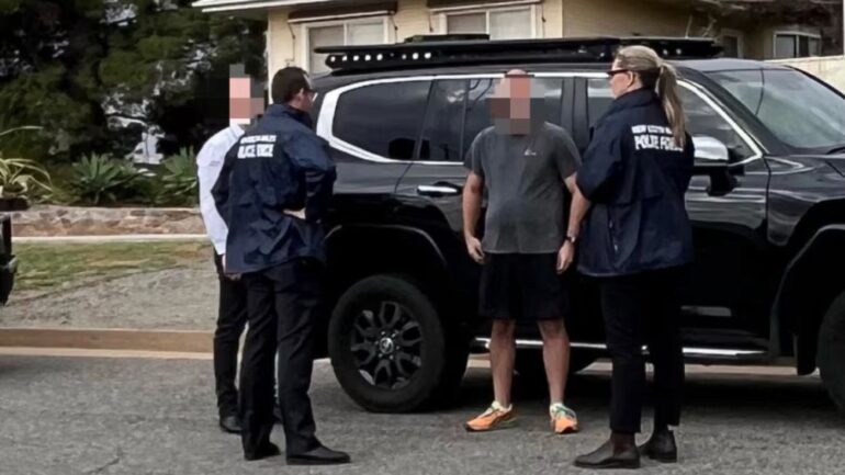 A 32-year-old man has been arrested after more than $700,000 in cash allegedly vanished from ATMs across Broken Hill in outback New South Wales.